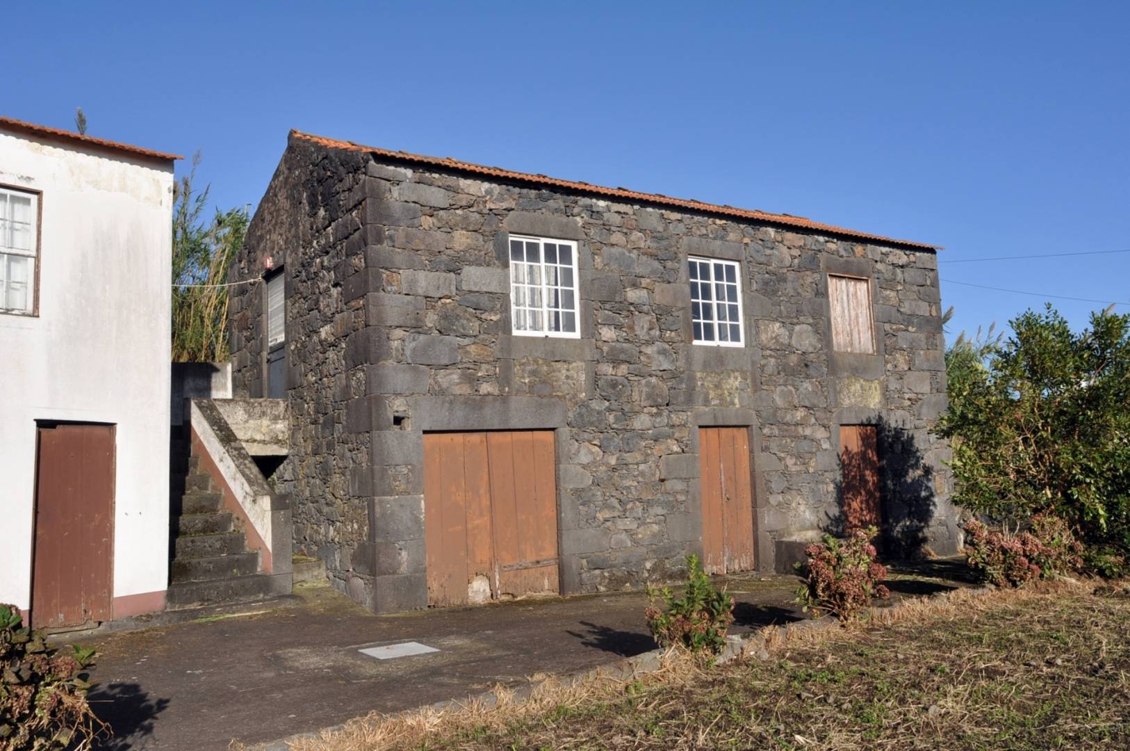 Two stone houses for sale